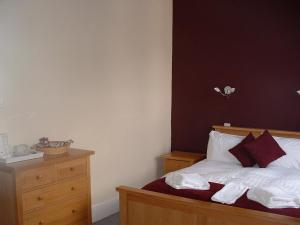 Cama o camas de una habitación en Bath House Hotel