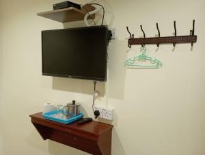 TV a/nebo společenská místnost v ubytování CH Budget Hotel