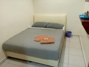 Postel nebo postele na pokoji v ubytování CH Budget Hotel