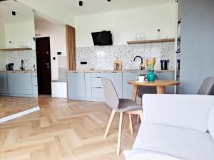 Kuchyňa alebo kuchynka v ubytovaní Apartament Północne Mazury