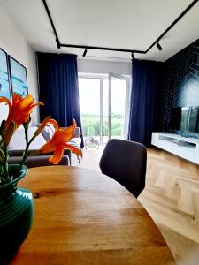 Posedenie v ubytovaní Apartament Północne Mazury