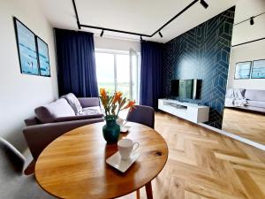 Posedenie v ubytovaní Apartament Północne Mazury