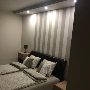 Postel nebo postele na pokoji v ubytování Villa Nirvana