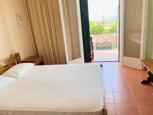 Postel nebo postele na pokoji v ubytování Klitemnistra Rooms