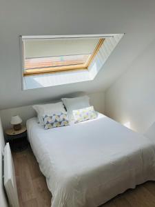 Posteľ alebo postele v izbe v ubytovaní Appartement Entre ville et nature