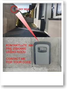 a scale with a red arrow next to a house at Wellnesska Vyhne in Vyhne