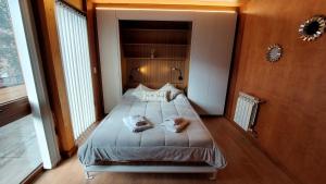 Postel nebo postele na pokoji v ubytování Departamento muy cálido y luminoso, 2 ambientes con amplio balcón, 3PAX (8V4)