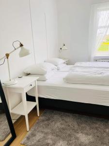 Riverside Hostel客房内的一张或多张床位
