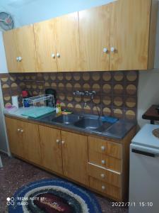 Dapur atau dapur kecil di Long Beach Apartment