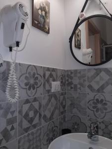 Kúpeľňa v ubytovaní CASA VACANZA DI VIA GIACALONE