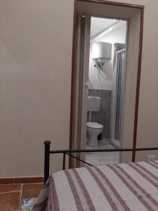Kúpeľňa v ubytovaní CASA VACANZA DI VIA GIACALONE
