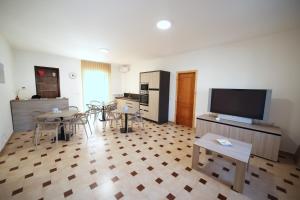 TV a/nebo společenská místnost v ubytování Petracuzza casa vacanze