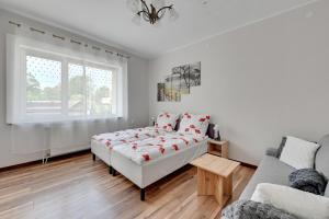 Posteľ alebo postele v izbe v ubytovaní Oliwa House by Platinium Lofts
