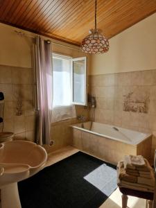 Ванна кімната в Chambres d'hôtes Villa bella fiora