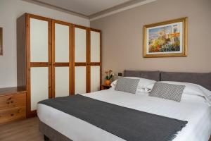 Posteľ alebo postele v izbe v ubytovaní Hotel Cristallo