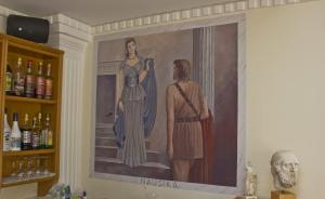 a painting of a woman and a man on a staircase at Nafsika Hotel in Rhodes Town