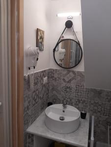 Kúpeľňa v ubytovaní CASA VACANZA DI VIA GIACALONE