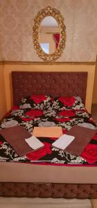Een bed of bedden in een kamer bij Aprtmani "M" br4