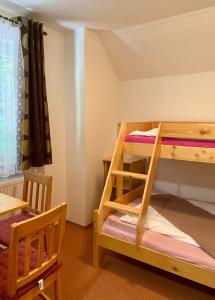 Postel nebo postele na pokoji v ubytování Alba Apartmany Železná Ruda