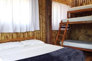 Postel nebo postele na pokoji v ubytování Casa de las Guacamayas