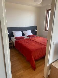 Кровать или кровати в номере Ylläs Chalets IX A9104