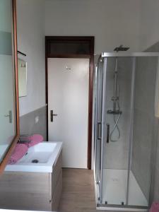 A bed or beds in a room at Casa Vacanze Breva
