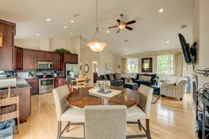 a kitchen and living room with a table and chairs at Mountain-View Eden in South Lake Tahoe