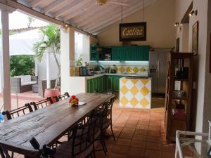 A kitchen or kitchenette at Casa Relax Hotel