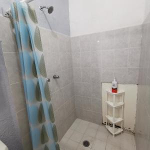 A bathroom at 2 bedroom apartment with a/c Wi-Fi best location!