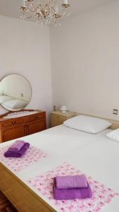 Postel nebo postele na pokoji v ubytování Apartman Milka