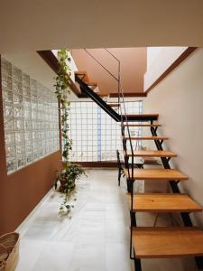 Posteľ alebo postele v izbe v ubytovaní Cool loft in the old town with rooftop terrace and fireplace