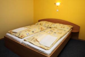 Postel nebo postele na pokoji v ubytování ASCONA
