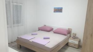 Postel nebo postele na pokoji v ubytování Apartman Dany