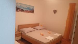 Postel nebo postele na pokoji v ubytování Apartman Dany