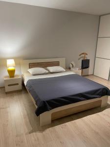 Postel nebo postele na pokoji v ubytování A2