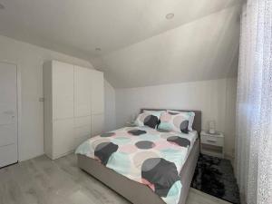 Postel nebo postele na pokoji v ubytování Apartman Pavenka