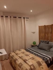 Posteľ alebo postele v izbe v ubytovaní Avignon studio cosy