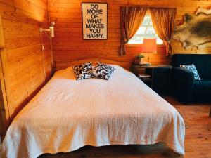 Postelja oz. postelje v sobi nastanitve Loond country house near the Lake