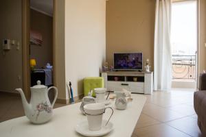 TV a/nebo společenská místnost v ubytování Kalamata Alex Apartments