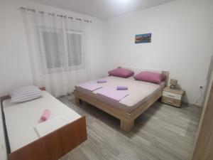Postel nebo postele na pokoji v ubytování Apartman Dany