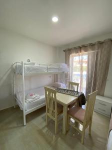 Postel nebo postele na pokoji v ubytování Villa Mateo