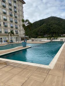 Bazén v ubytování LOFT COMPLETO, GRANJA BRASIL, EM ITAIPAVA nebo v jeho okolí