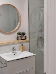 Koupelna v ubytování Apartamento pequeño, coqueto y céntrico.