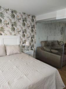 Postel nebo postele na pokoji v ubytování Apartamento pequeño, coqueto y céntrico. + 5 fotografií