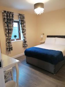Ein Bett oder Betten in einem Zimmer der Unterkunft Atlantic way Apartment