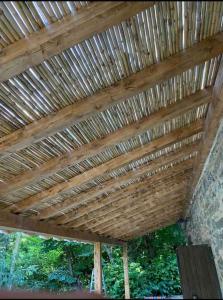 a wooden roof on top of a building at Villa Terria in Bagni di Lucca