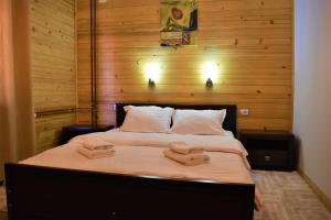 Posteľ alebo postele v izbe v ubytovaní Srna Chalet - Rooms
