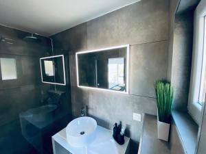 Kúpeľňa v ubytovaní Villa Magic look