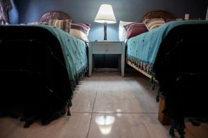 Ein Bett oder Betten in einem Zimmer der Unterkunft The Bersal House