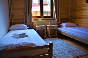 Posteľ alebo postele v izbe v ubytovaní Srna Chalet - Rooms